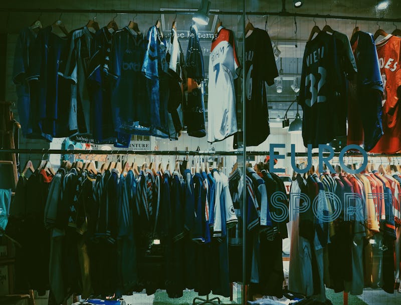 Football jerseys on display in clothing store